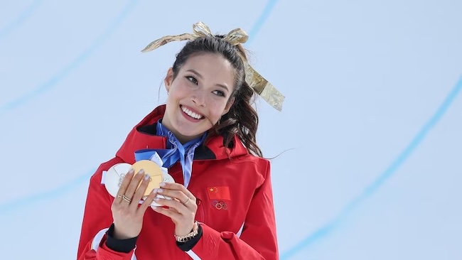 Eileen Gu’s Gold Medal Paradox